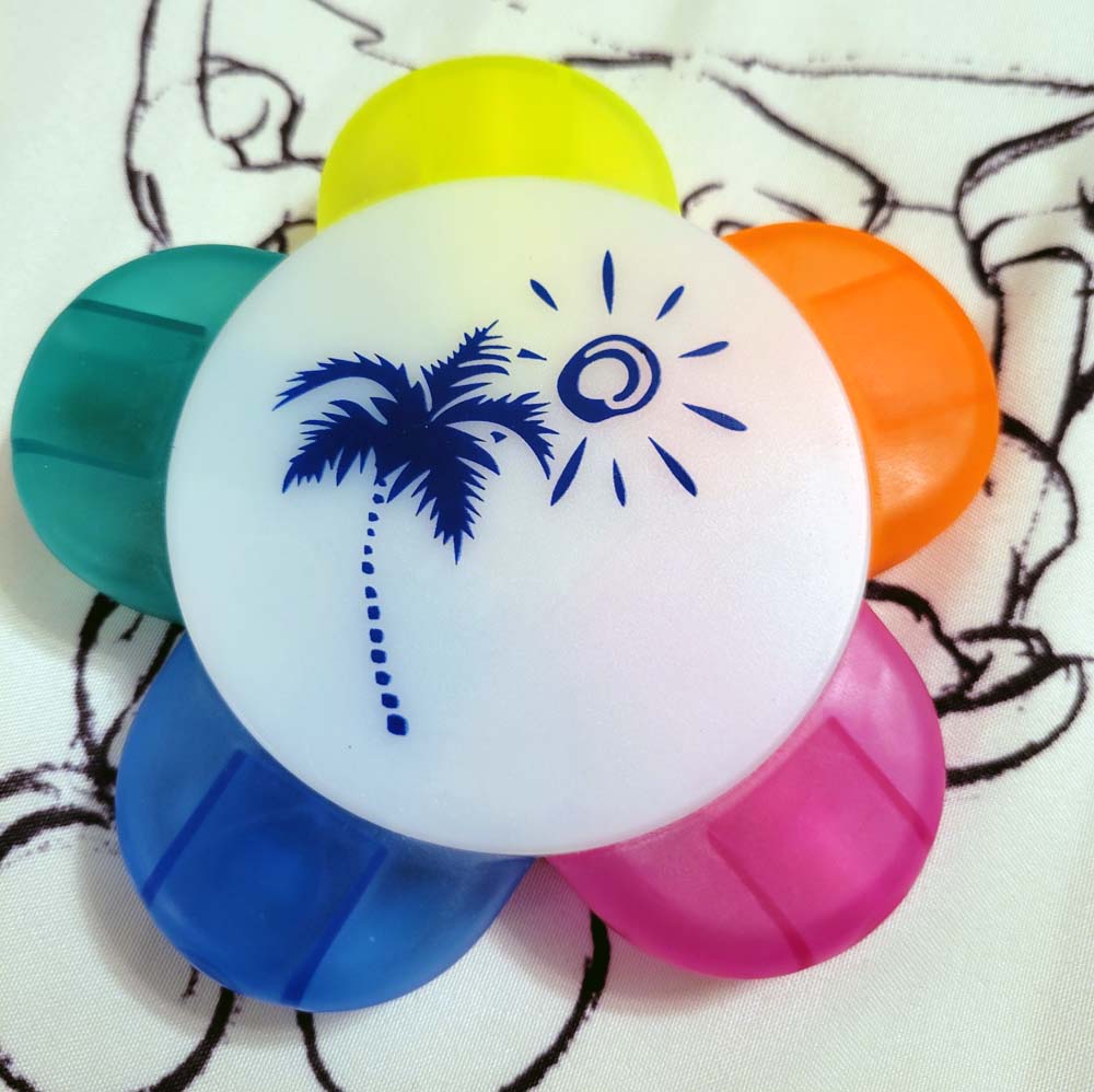 Dreams Unlimited Travel Agency - gift bag - flower highlighter