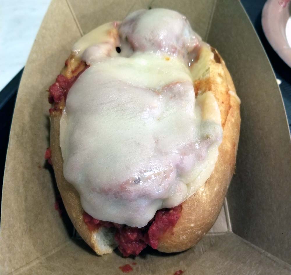 a snack size meatball sub with 3 meaty balls at PizzeRizzo