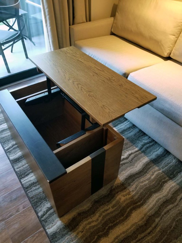 Deluxe Studio at Copper Creek - couch and coffee table extended