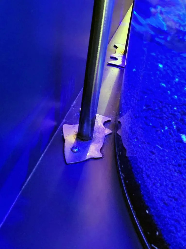 support pole footer in the shape of a fish - Disney World